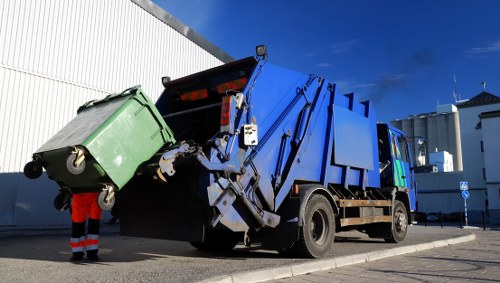 Residential property with a skip in the driveway